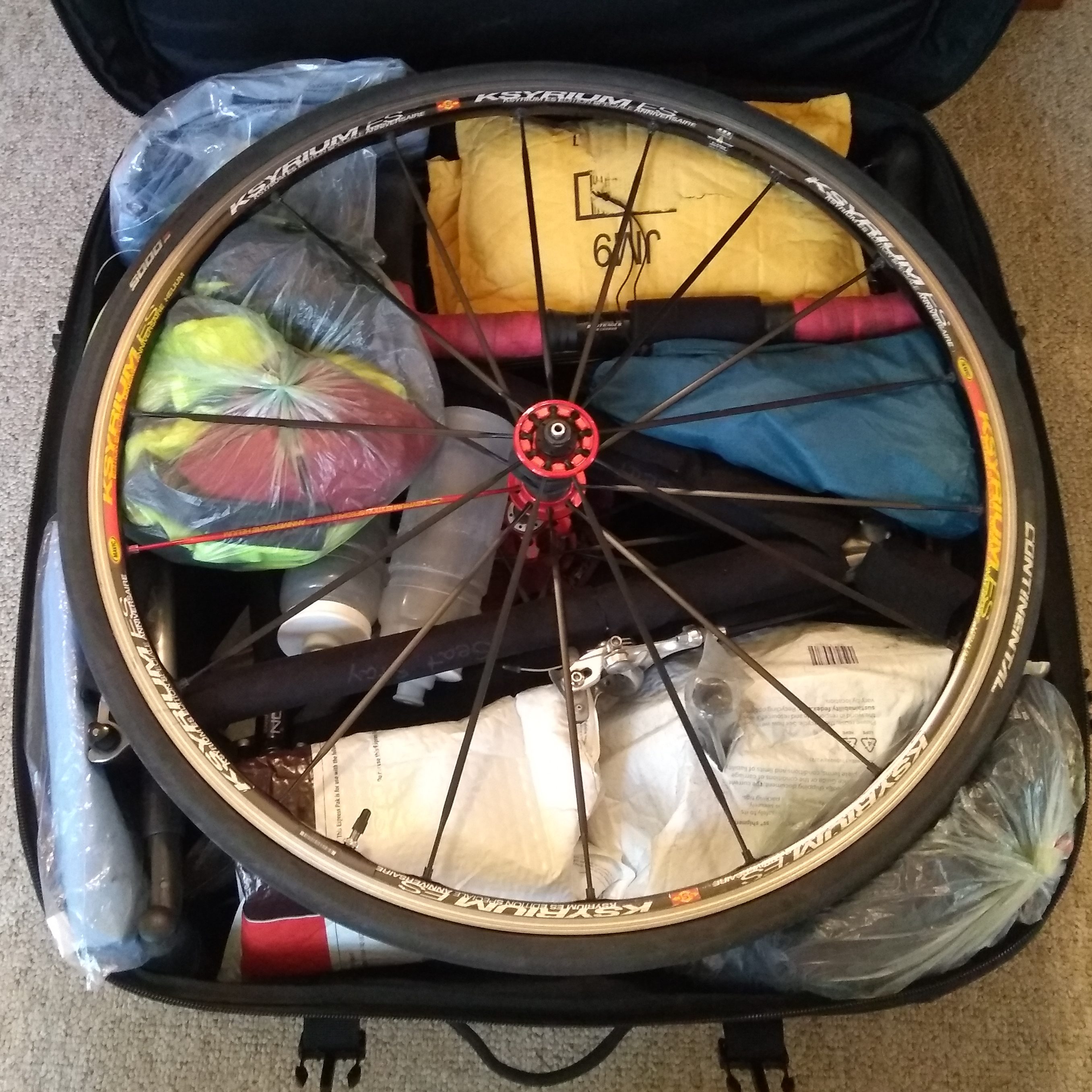 Suitcase with my bike packed into it
