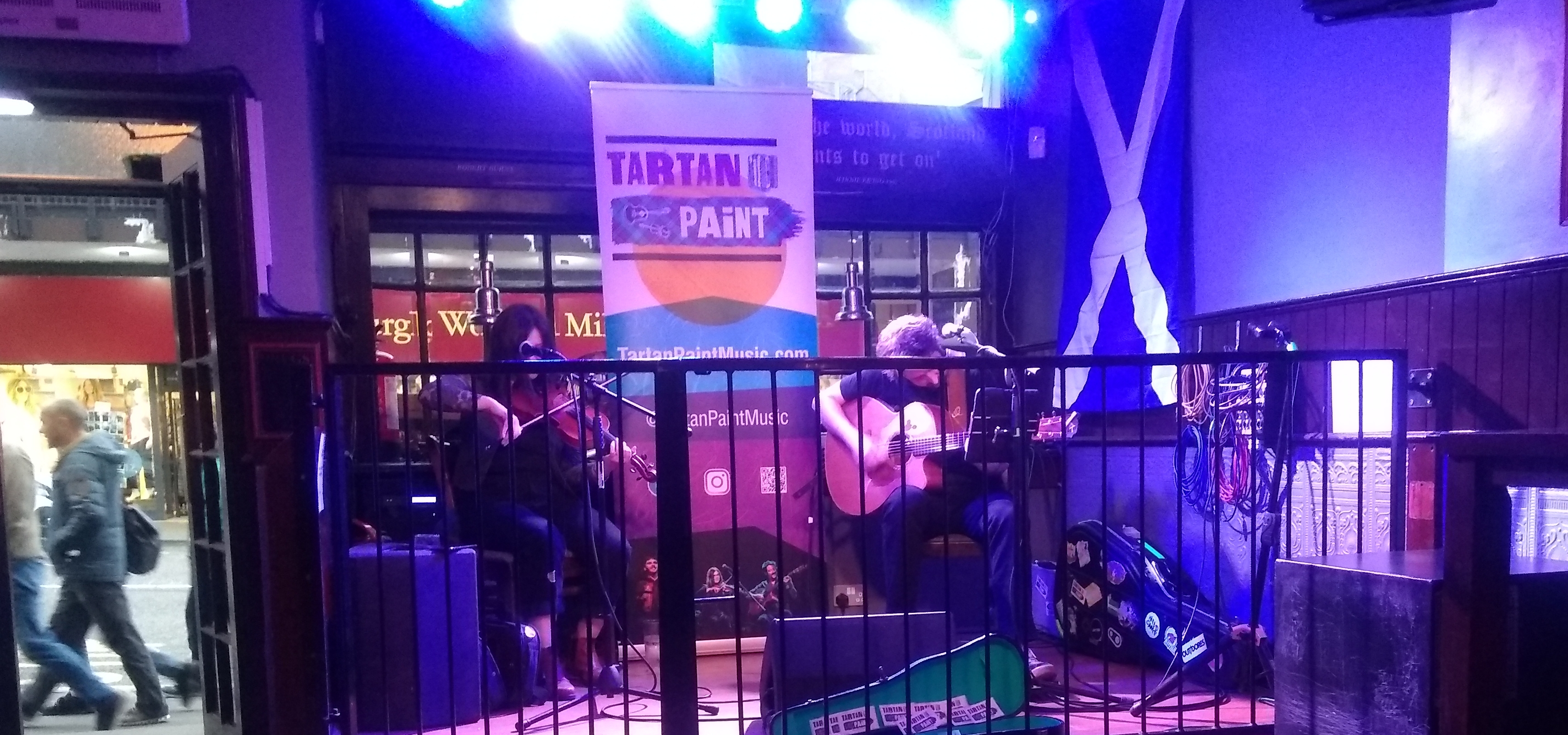 Tartan Paint band playing in pub at night