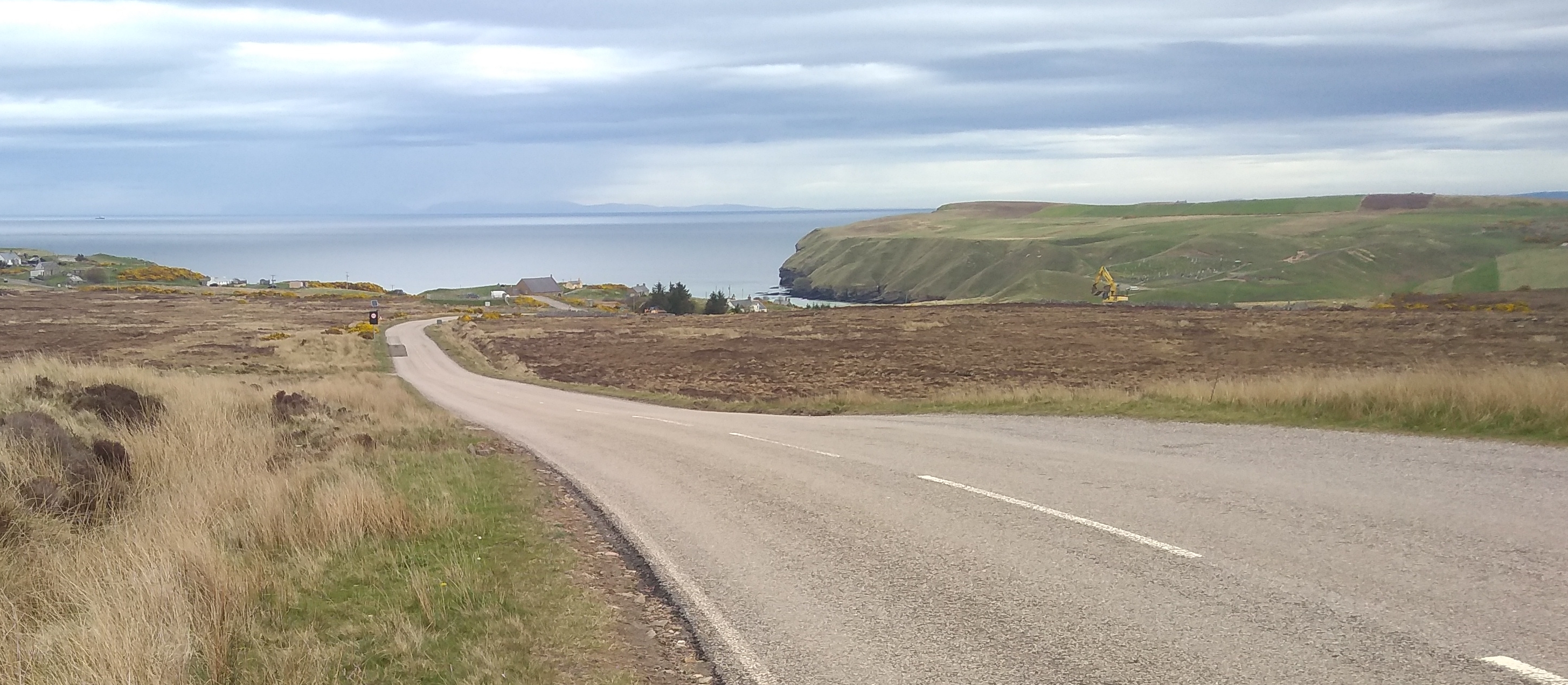 Road and sea and cloud